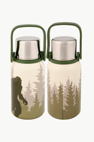 Two insulated bottles with forest design and Bigfoot silhouette on a white background